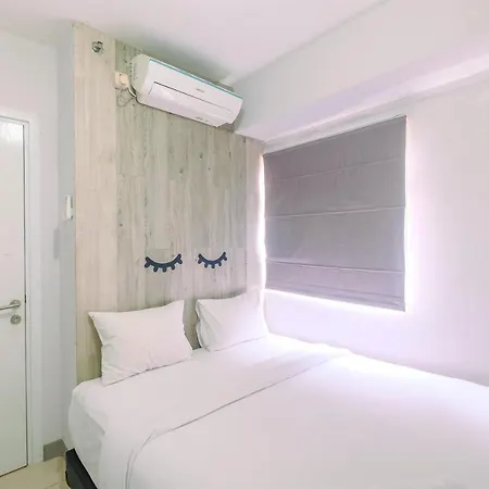 Furnished Green Pramuka 1Br Apartment With Modern Style And City View By Travelio